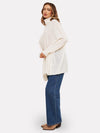 white cashmere poncho with turtle neck side view 