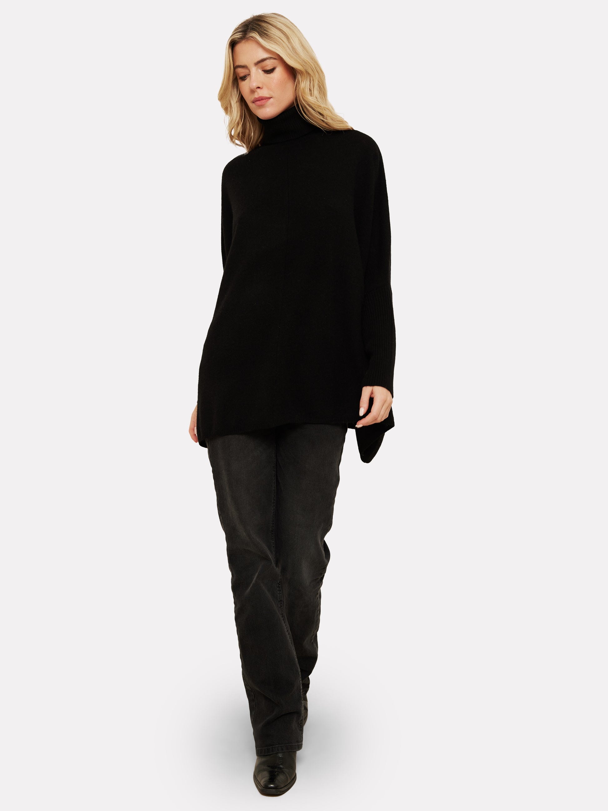 black cashmere poncho with turtle neck and ribbed sleeves 