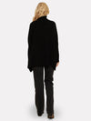 black cashmere poncho with turtle neck and ribbed sleeves rear view