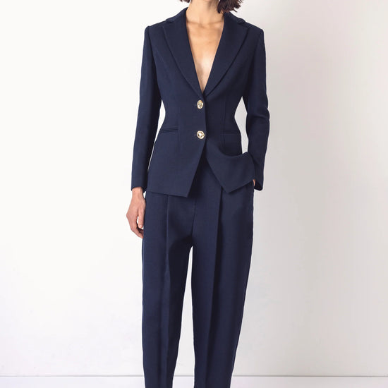 navy structured blazer with 2 gold hammered buttons model shot
