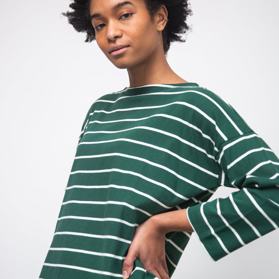 green and off white stripe top with boat neck and long sleeves