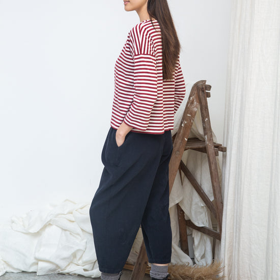 burgundy stripe top with boat neck and long sleeves  side view