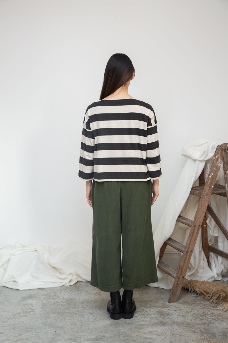 charcoal grey stripe top with boat neck and long sleeves rear view