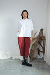 short sleeve white shirt with boxy fit and peter pan collar model shot