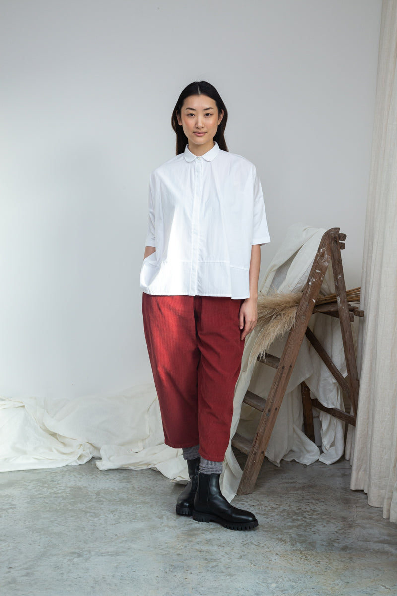 short sleeve white shirt with boxy fit and peter pan collar model shot