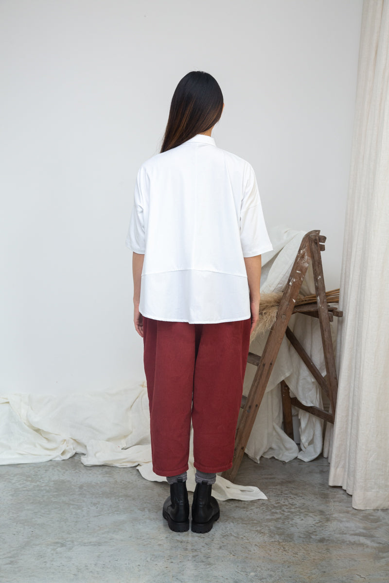 short sleeve white shirt with boxy fit and peter pan collar rear view