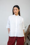 short sleeve white shirt with boxy fit and peter pan collar
