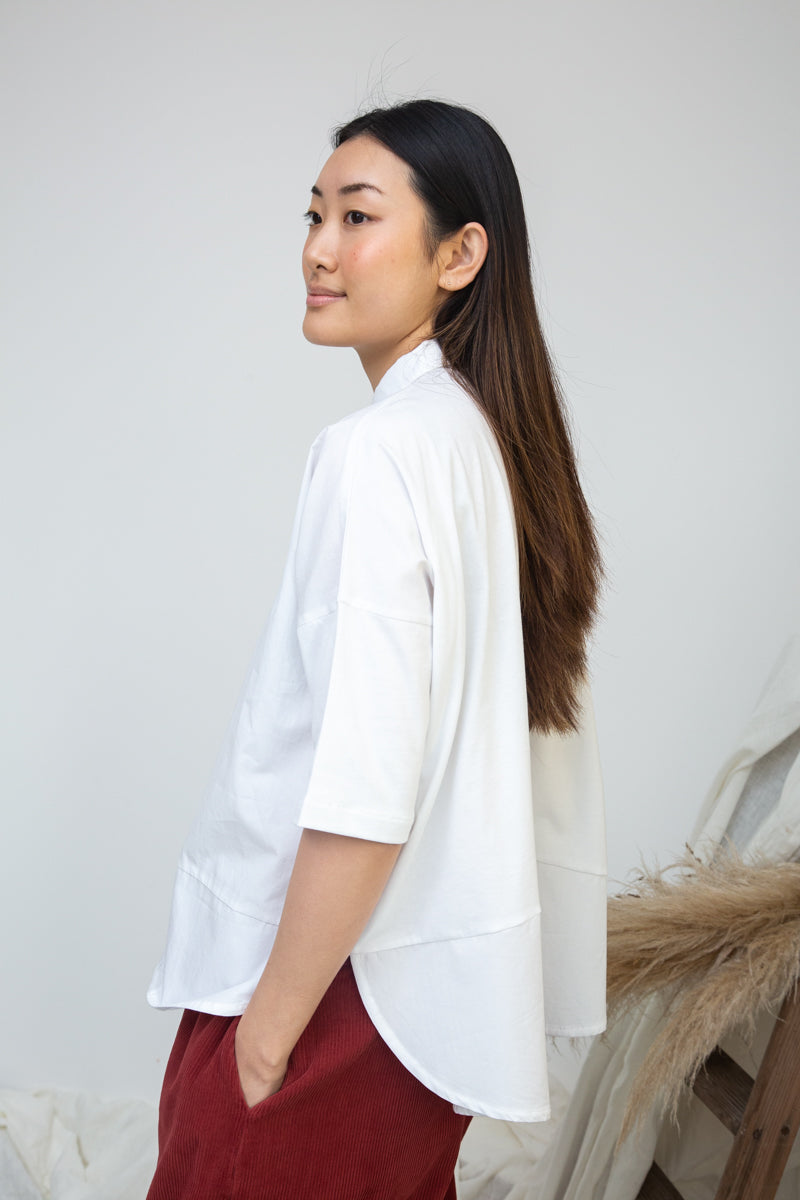 short sleeve white shirt with boxy fit and peter pan collar side view