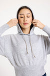 grey hoodie with rhinestone drawstrings model shot