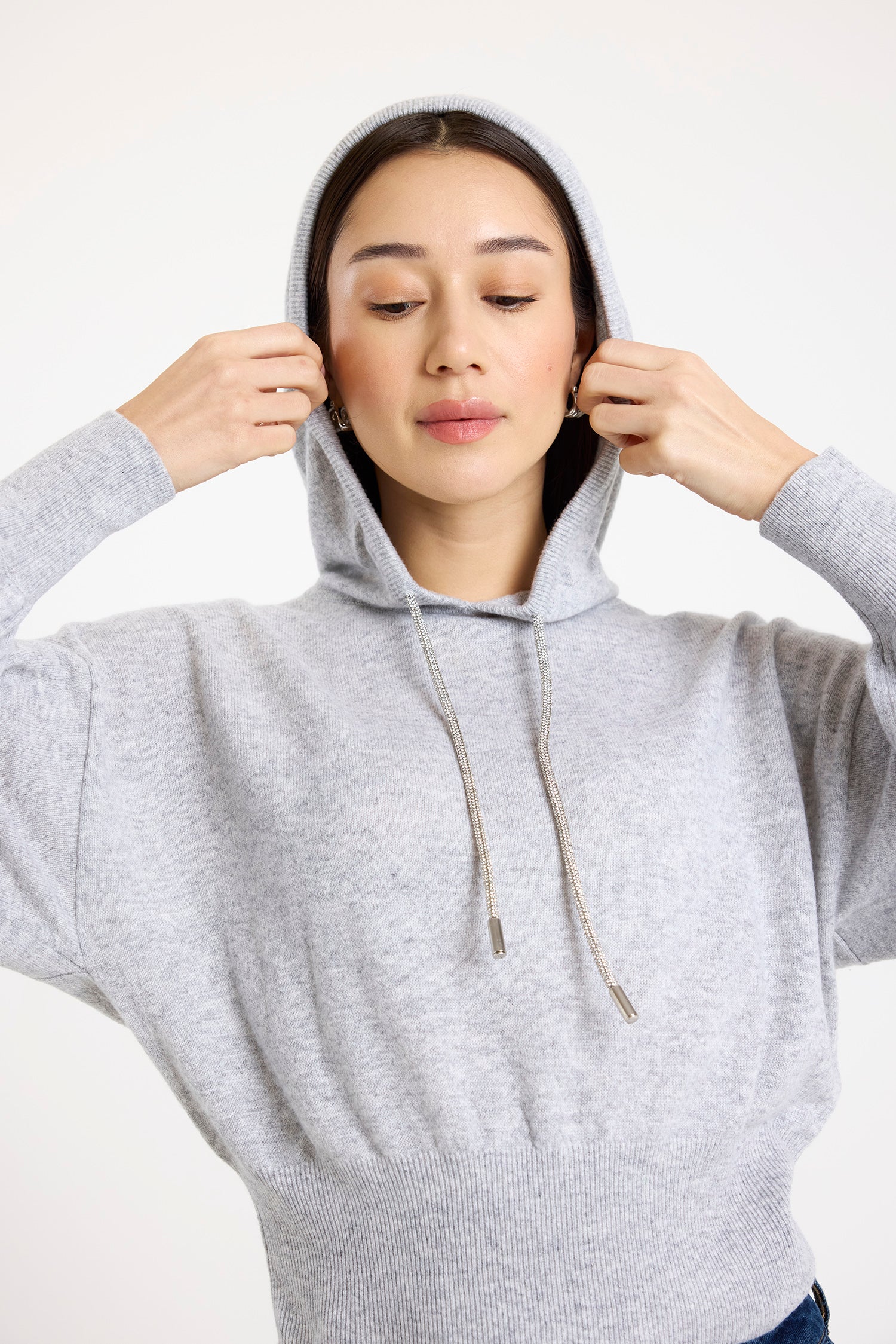 grey hoodie with rhinestone drawstrings model shot