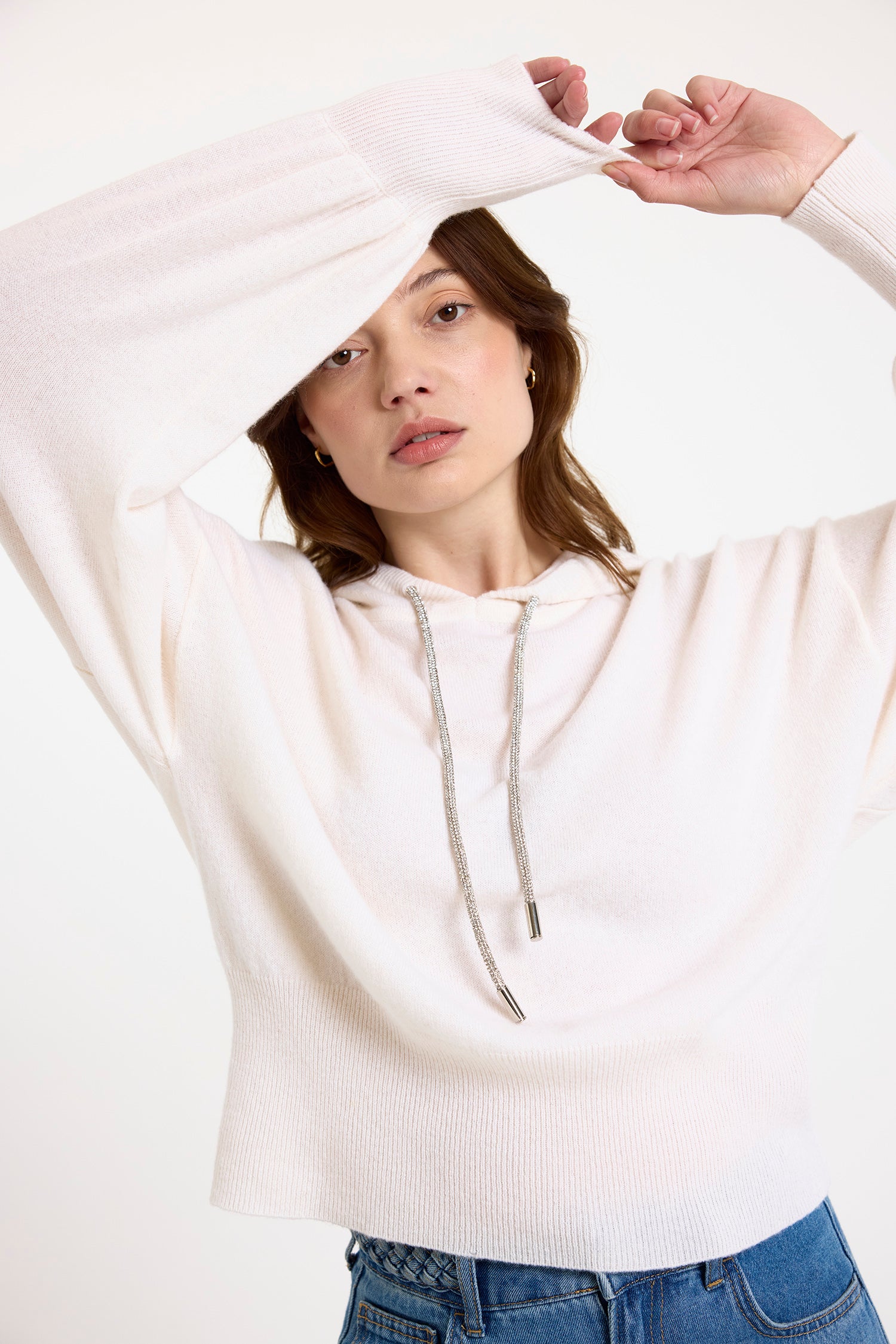 white hoodie with rhinestone drawstrings model shot
