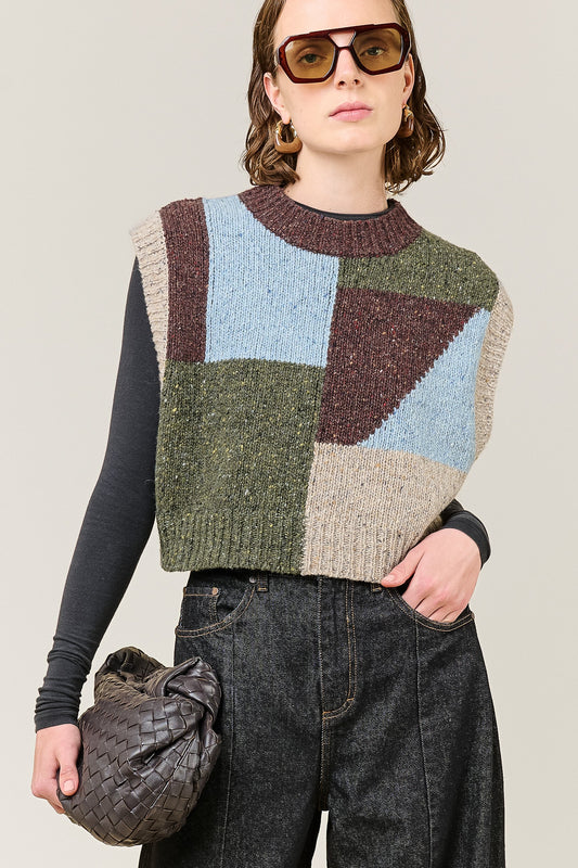 woman wearing multi colour geometric knit vest 