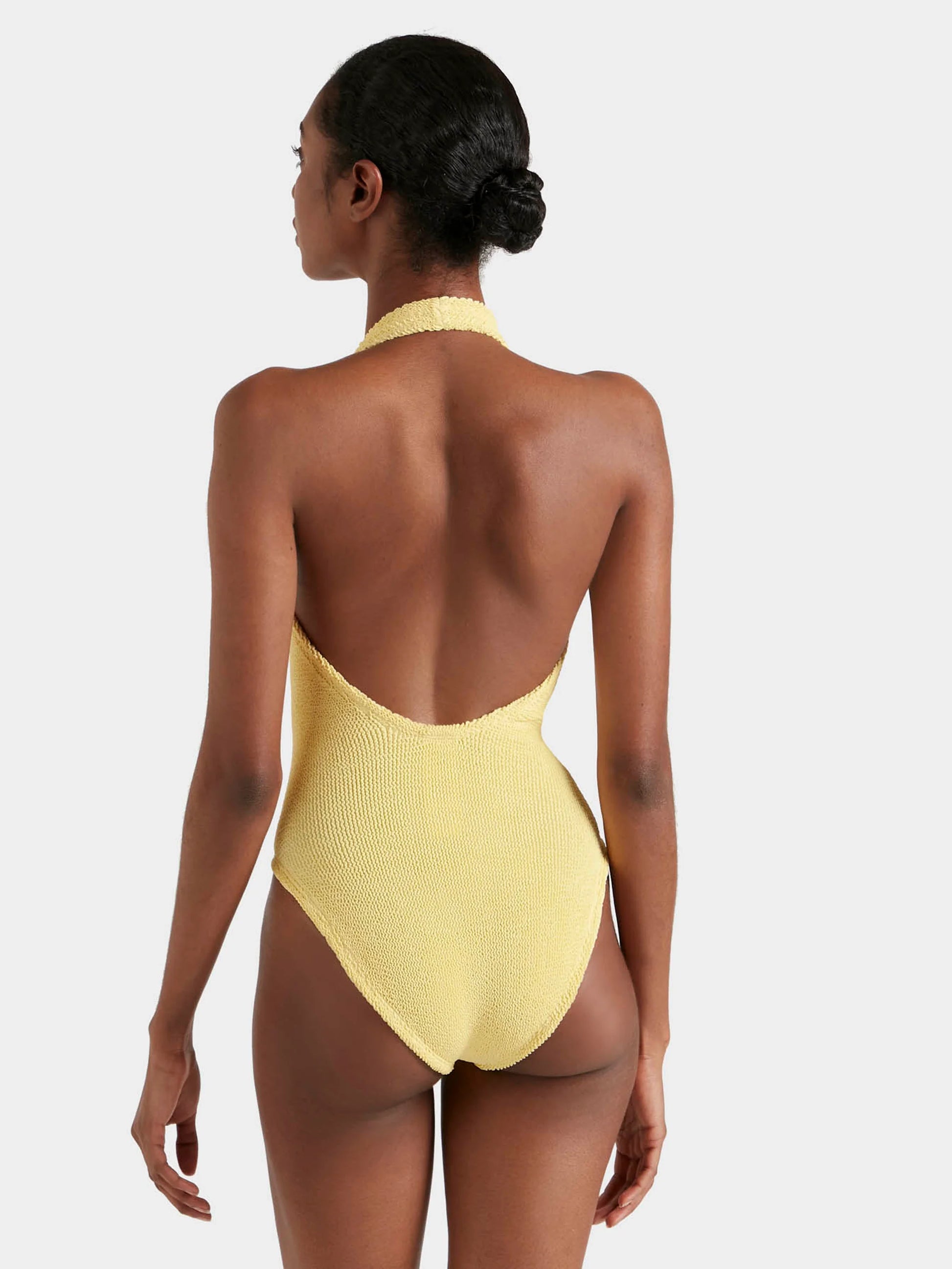 Rear view of onesize swimsuit in butter yellow