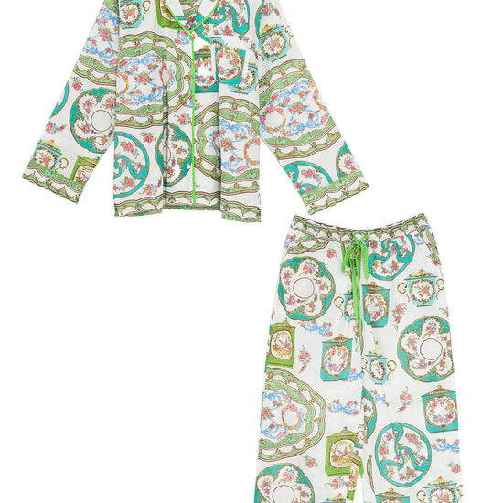 Floral pajama set with shirt and pants on a white background
