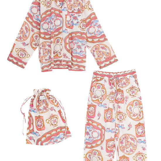 Floral pajama set with matching hat on a white background