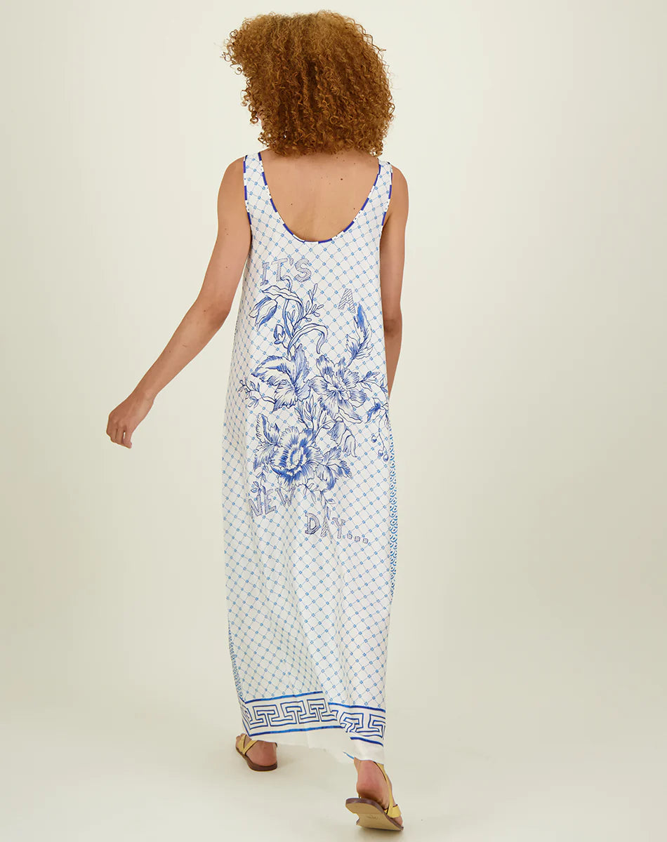 Scoop neck thick strap slip dress in blue and white with snake design on the front and floral and "it's a new day" design on back
