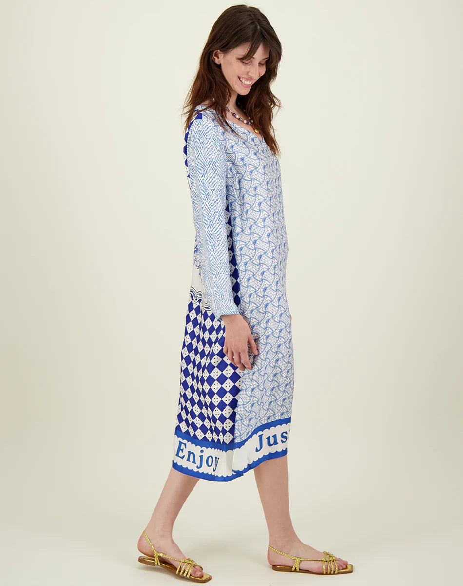 White and blue V neck midi dress with raw edge neckline long sleeves and a border saying "just enjoy"