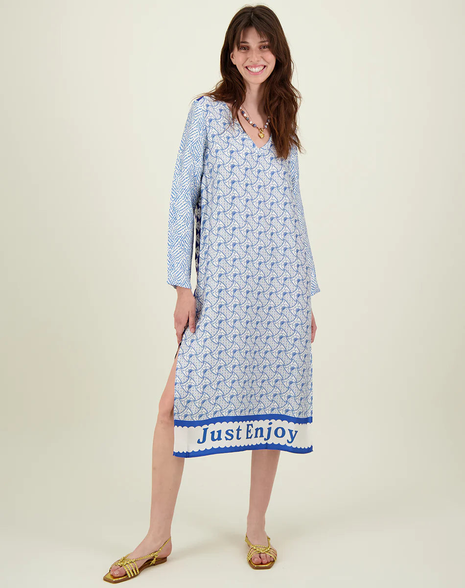 White and blue V neck midi dress with raw edge neckline long sleeves and a border saying "just enjoy"