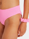 Close up detail of hot pink one sie bikini bottoms