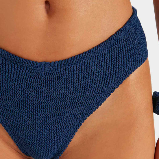 Close up of navy bikini bottoms from HunzaG