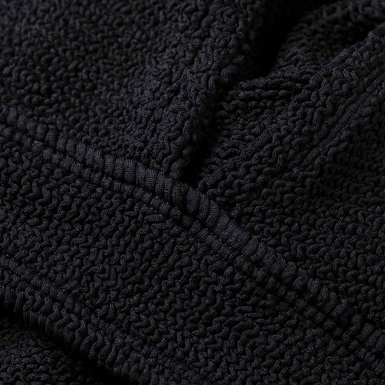 close up of black fabric of one size bikini from HunzaG