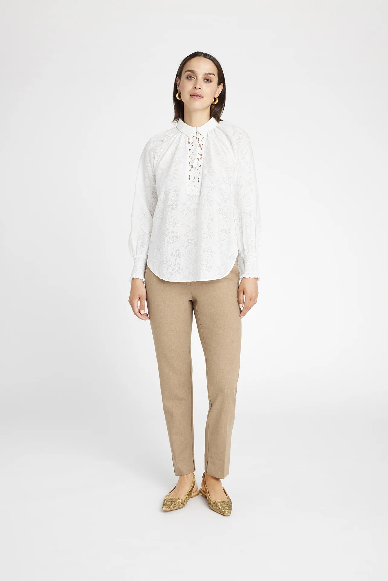 white collared blouse with shirred sleeves on model