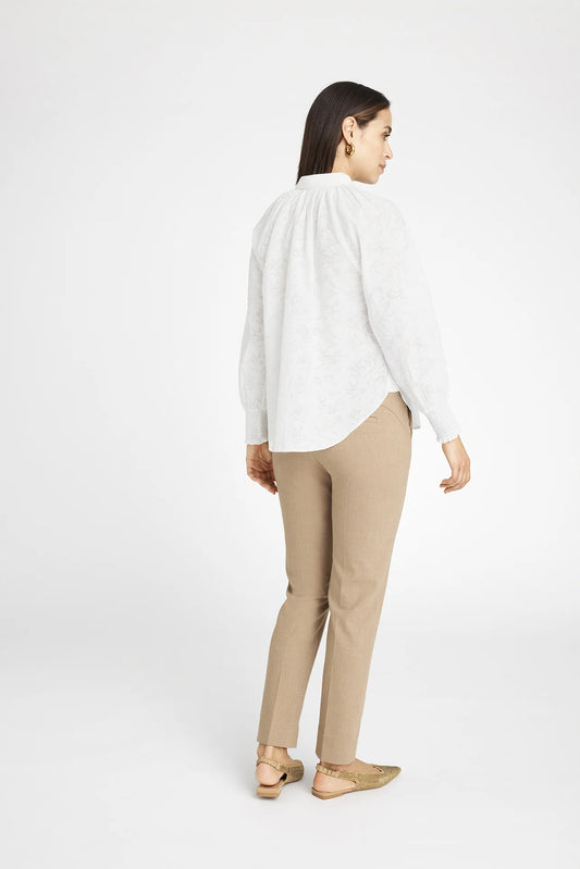 Rear view of white blouse with small collar