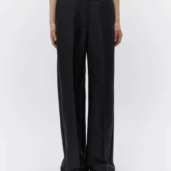 wide leg black suit trousers with belt loops model shot