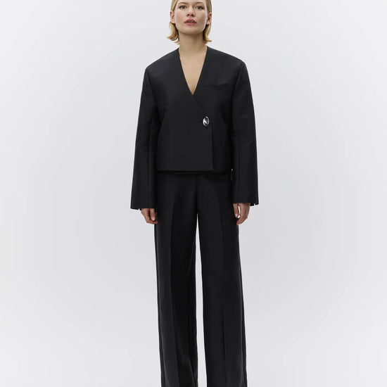 wide leg black suit trousers with belt loops model shot