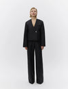 wide leg black suit trousers with belt loops model shot
