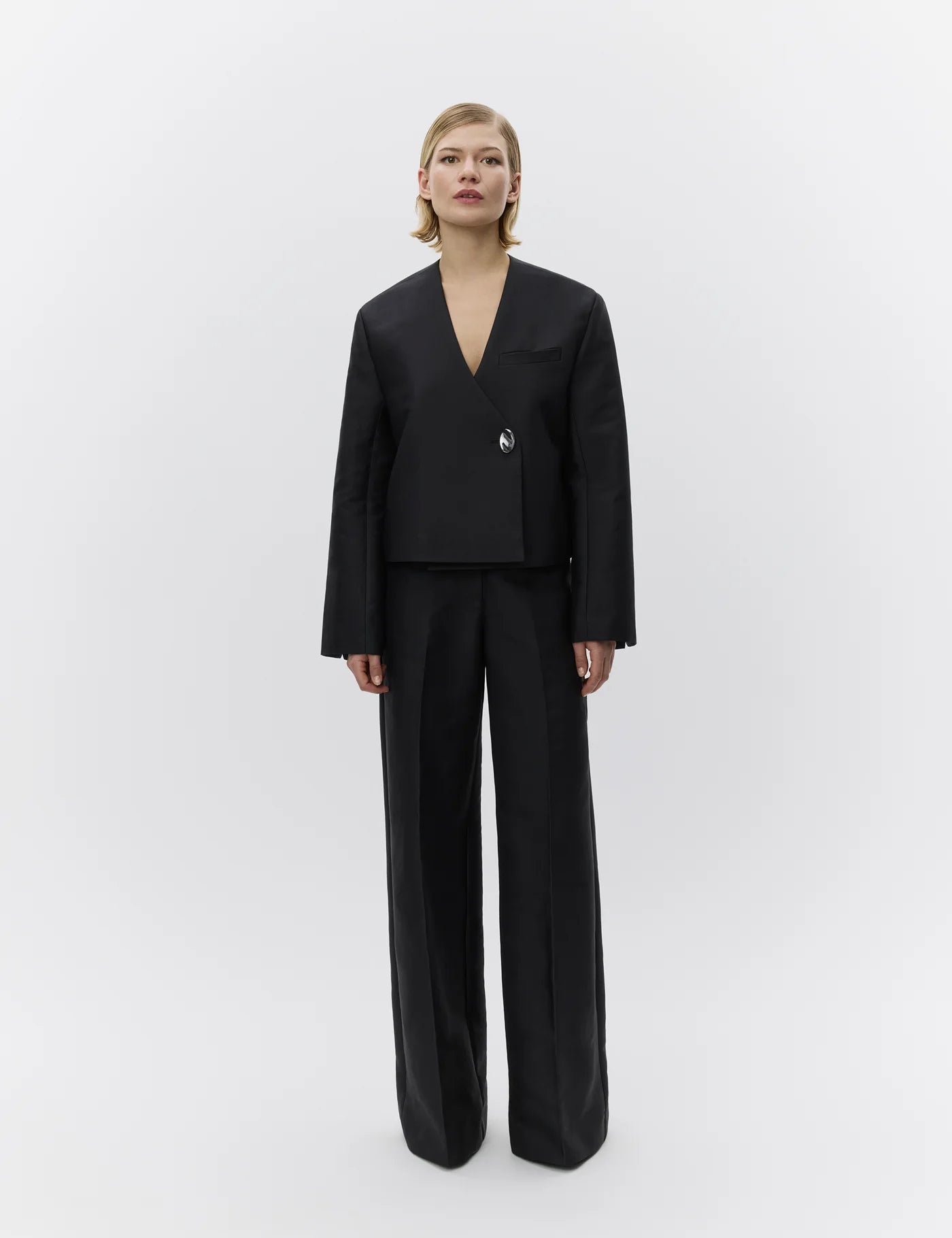 wide leg black suit trousers with belt loops model shot