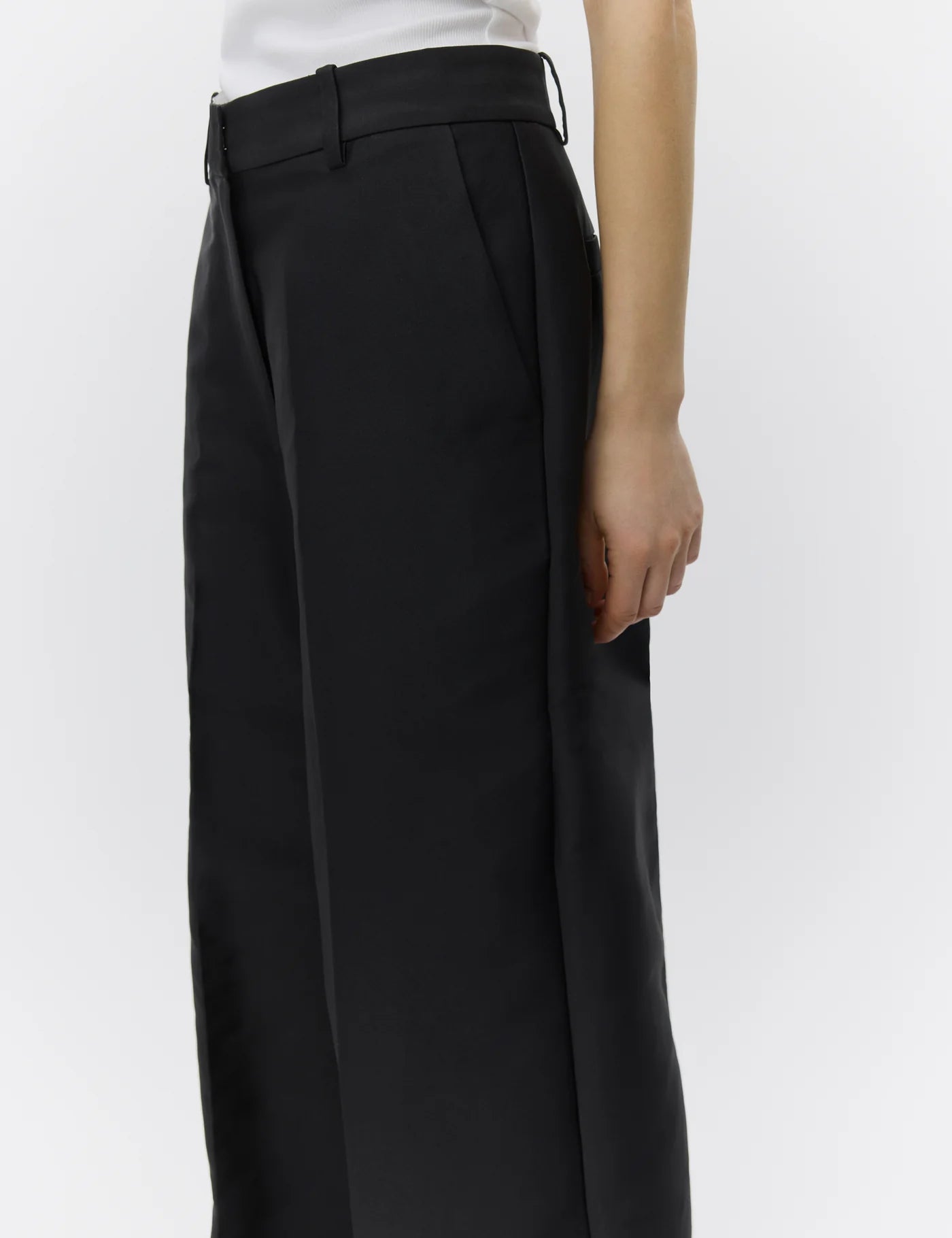 wide leg black suit trousers with belt loops close up