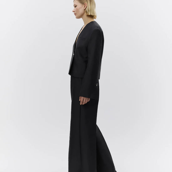 wide leg black suit trousers with belt loops model shot side view