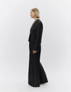 wide leg black suit trousers with belt loops model shot side view