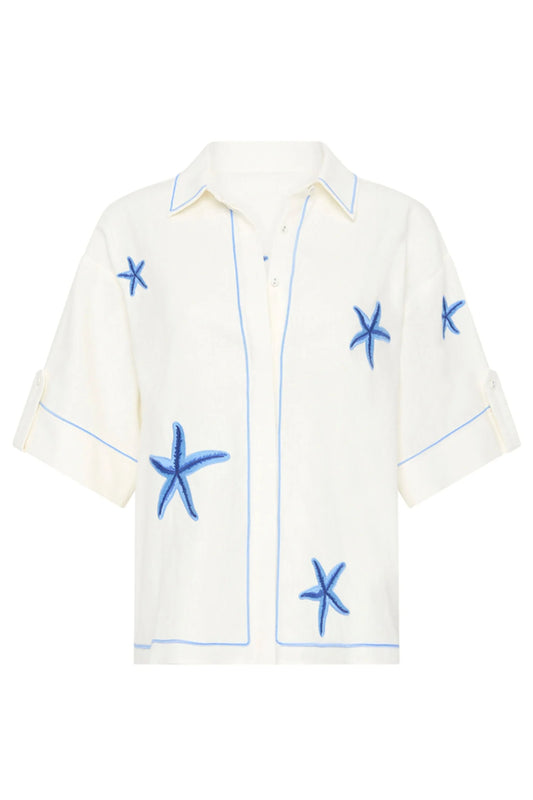 white shirt with short sleeves and blue star fishes 