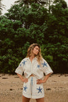 white shorts with blue starfish with elasticated drawstring waist model shot