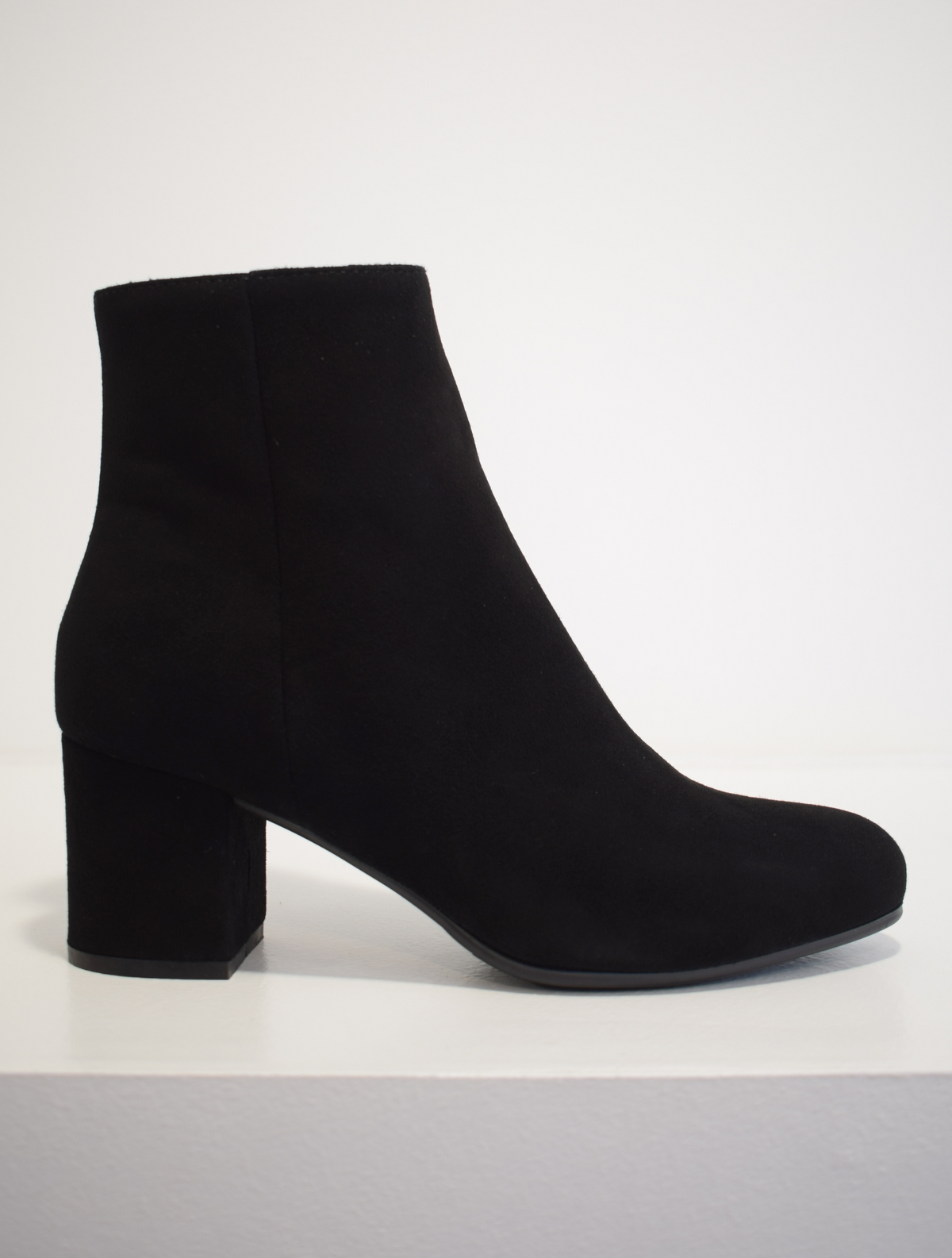 black suede ankle boot with side zip and almond toe