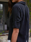 Black shirt with two chest pockets roll up arms classic collar and split back hem