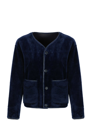 navy faux fur reversible round neck jacket with patch pockets, long sleeves, black buttons and interior dark navy faux suede with fur detailing