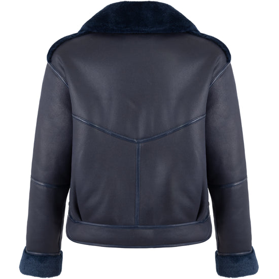 navy blue faux fur reversible short jacket with peter pan collar and side pockets rear view