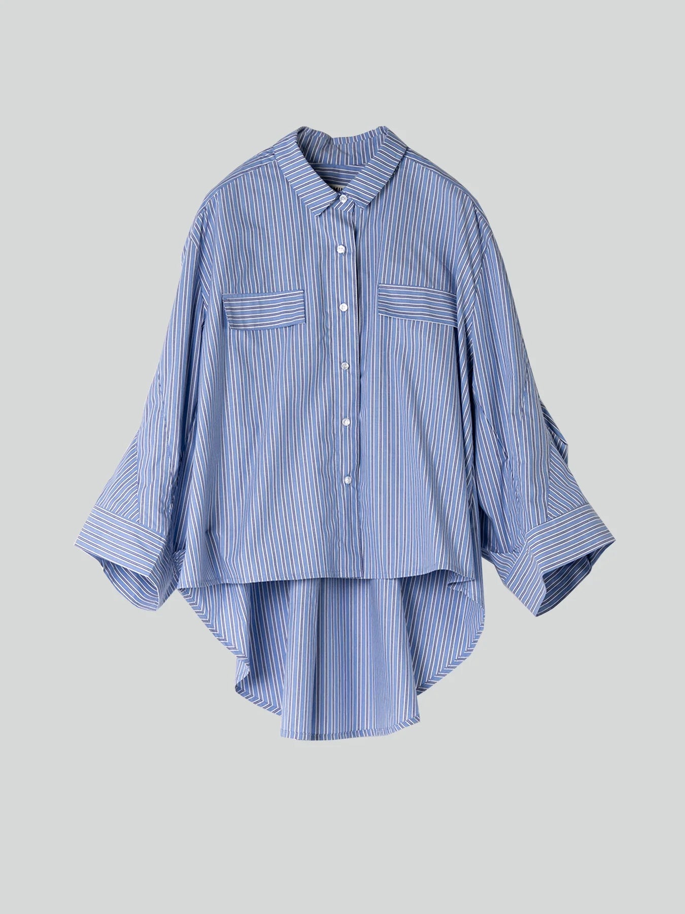 blue striped shirt with wide sleeves and dipped hem with chest pockets