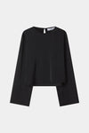 A black long-sleeve top with a unique layered, asymmetrical hem design, displayed flat against a light gray background.