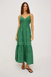 Model shot of green strappy dress worn with flip flops