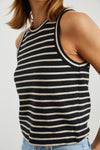 Sleeveless black and neutral stripe top with a round neck