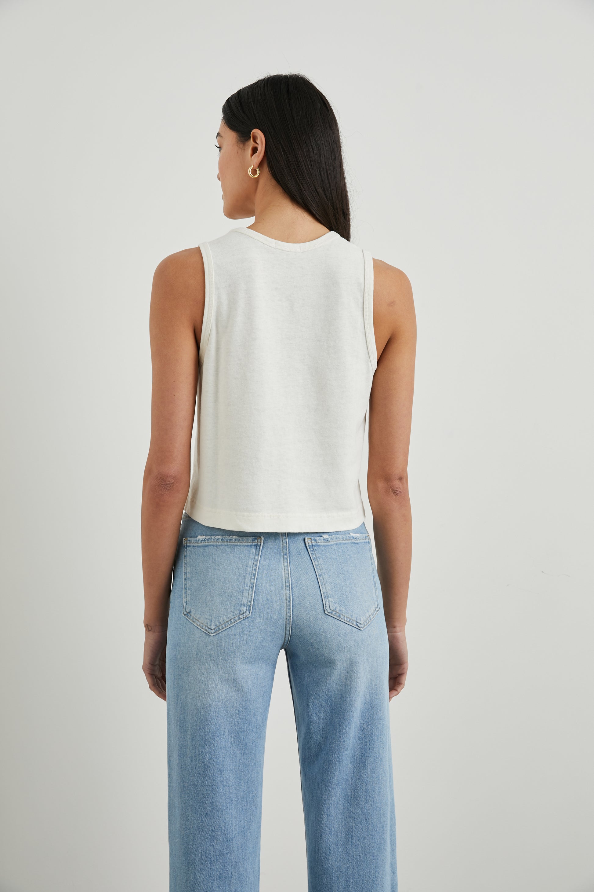 Sleeveless boxy ecru tank top from rear view