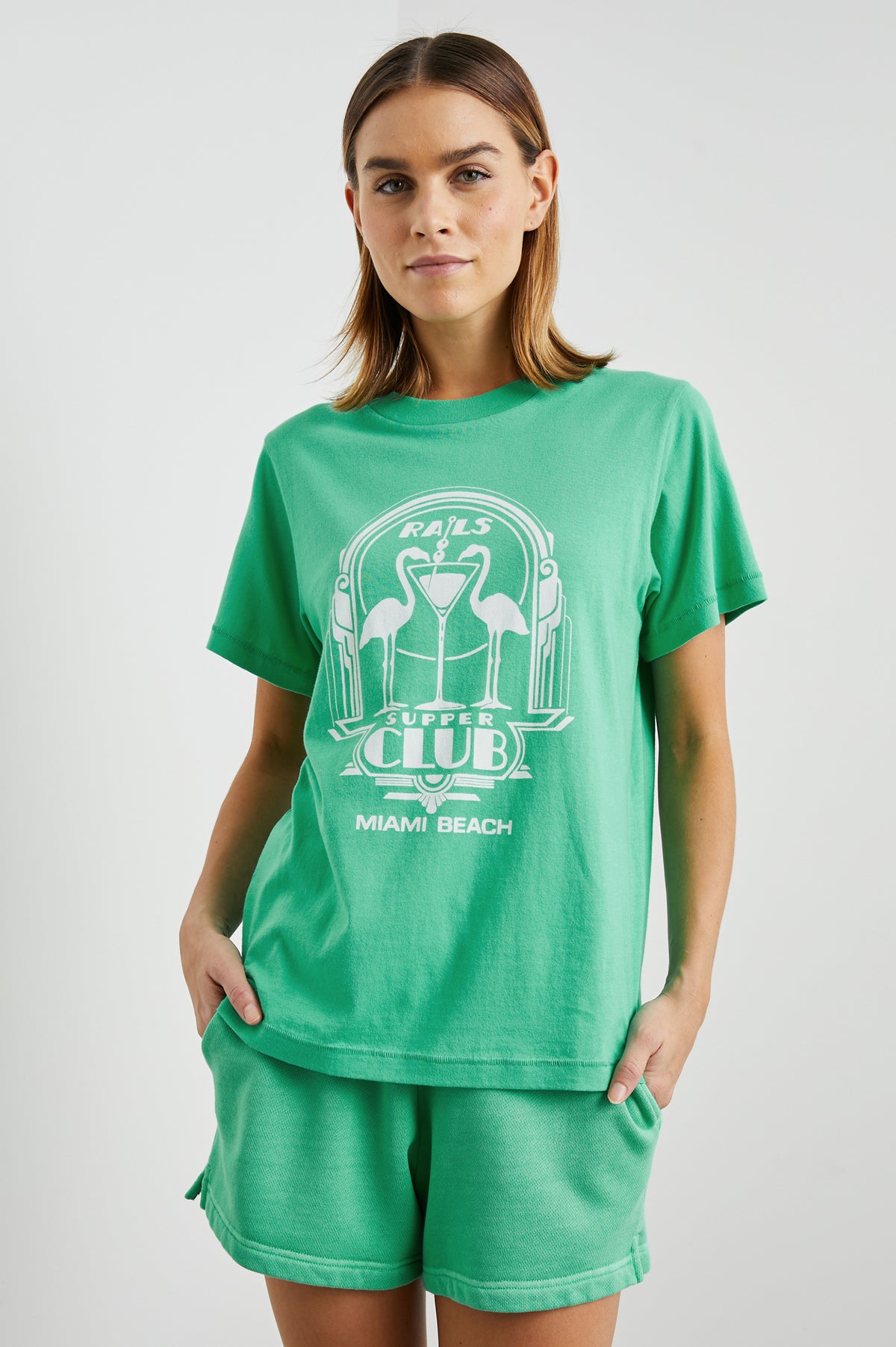 Boyfriend fit green tee with Flamingo design decal and short sleeves