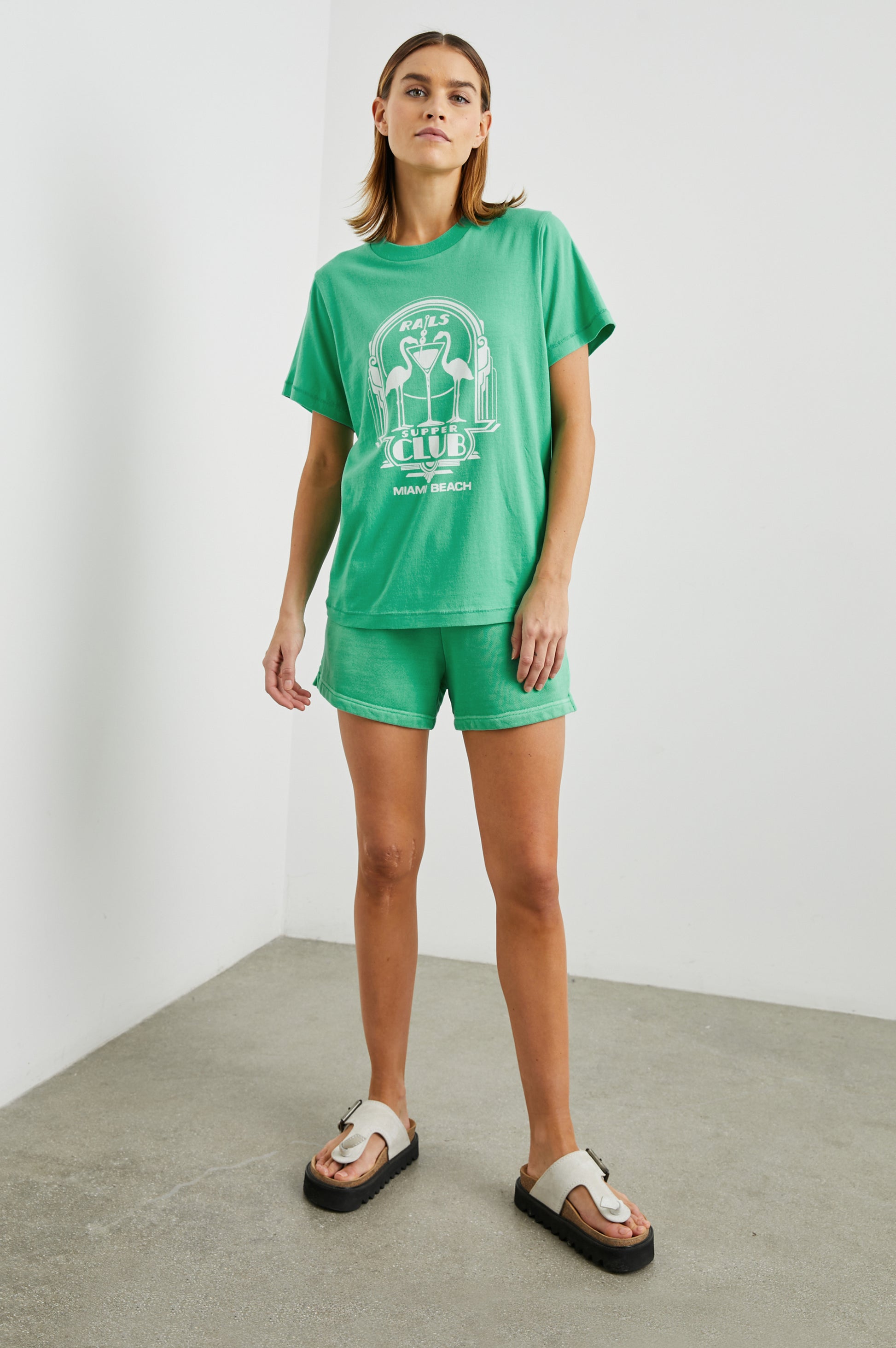 Boyfriend fit green tee with Flamingo design decal and short sleeves