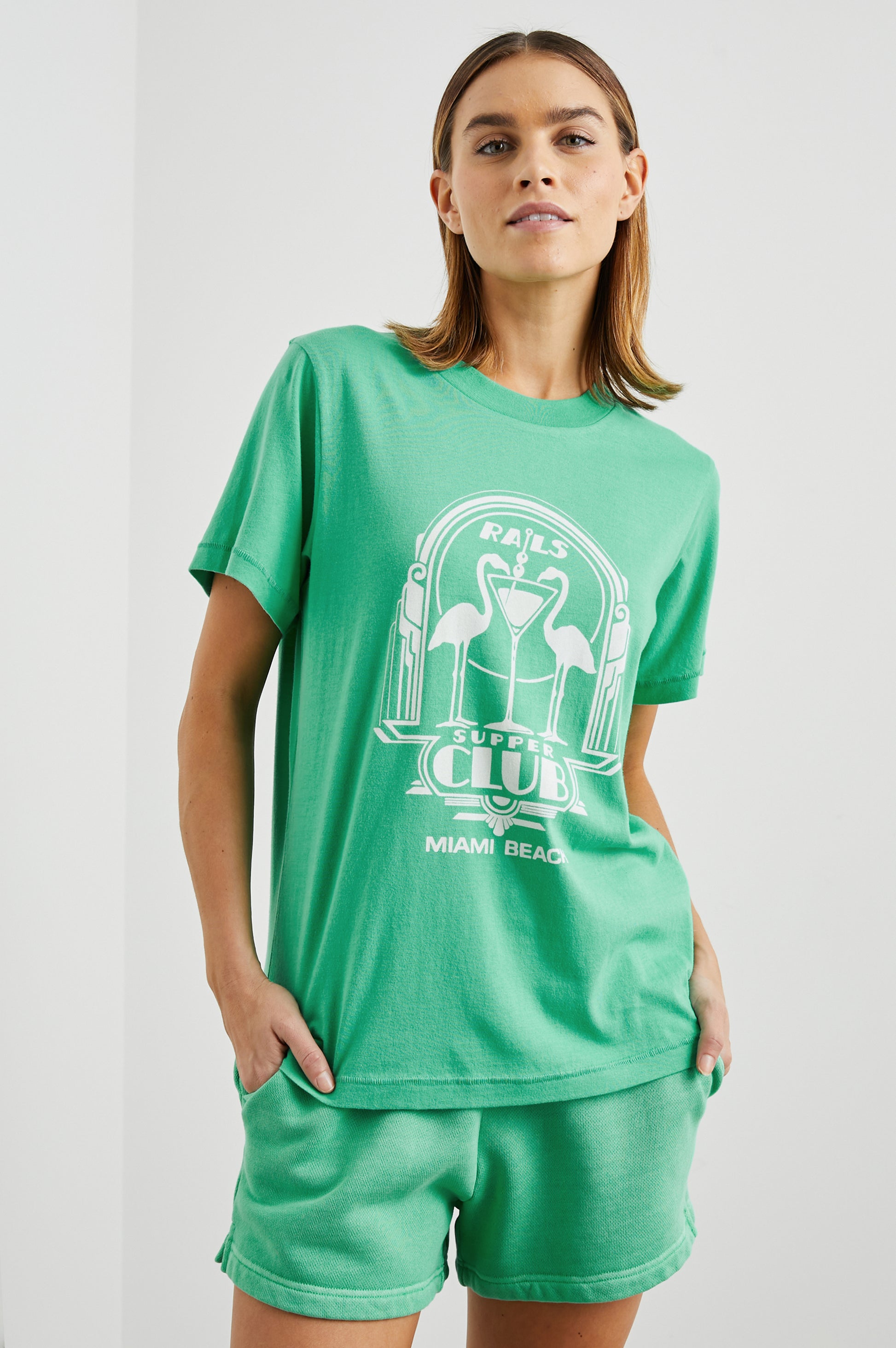 Boyfriend fit green tee with Flamingo design decal and short sleeves