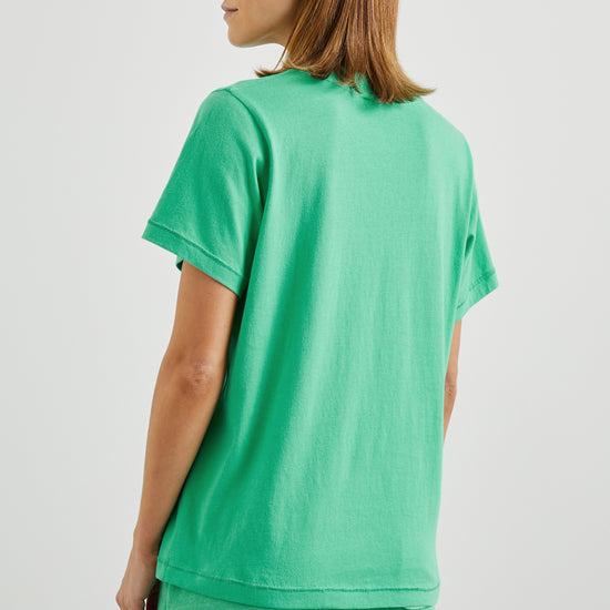 Boyfriend fit green tee with Flamingo design decal and short sleeves rear view