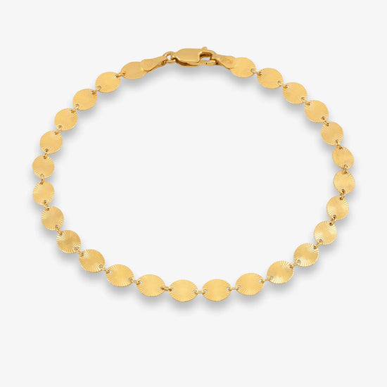 Gold bracelet by Rachel Jackson on a white background